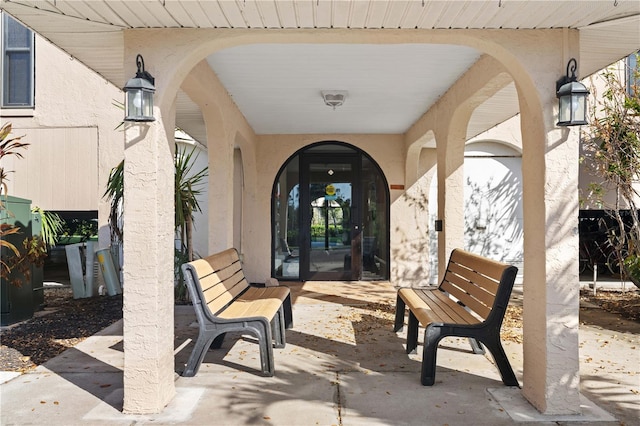 property entrance with a patio