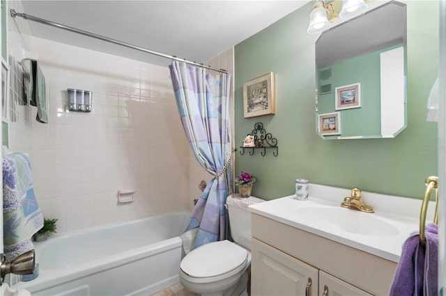 full bathroom featuring toilet, shower / bath combo, and vanity