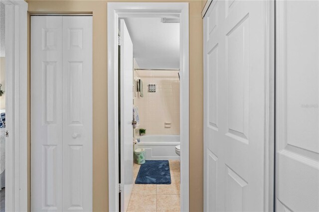 25188 Marion Ave Unit B304, Punta Gorda, FL 33950 - hall featuring baseboards and tile patterned floors