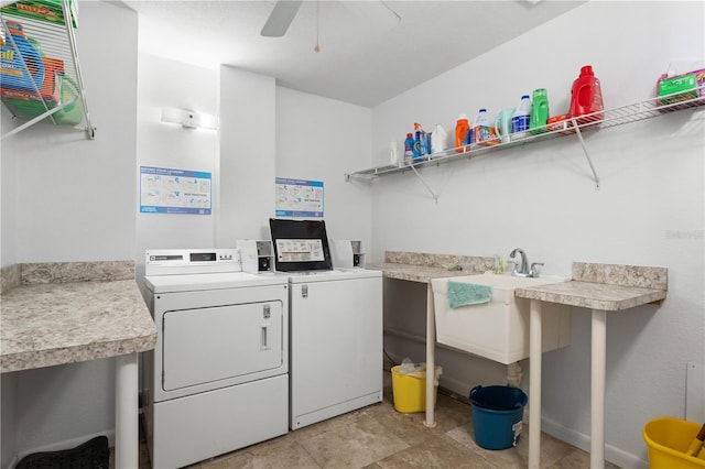 laundry room featuring ceiling fan, sink, and washing machine and clothes dryer