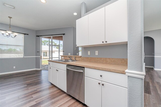 kitchen with white cabinetry, a notable chandelier, a sink, and stainless steel dishwasher