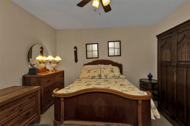 bedroom with ceiling fan and carpet