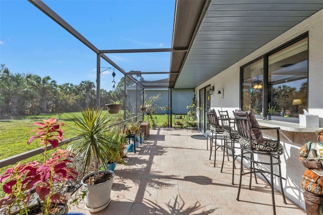 view of patio / terrace with glass enclosure