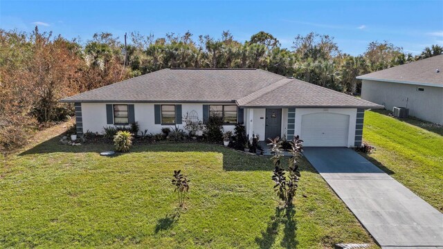 single story home with a front yard, a garage, and central AC unit