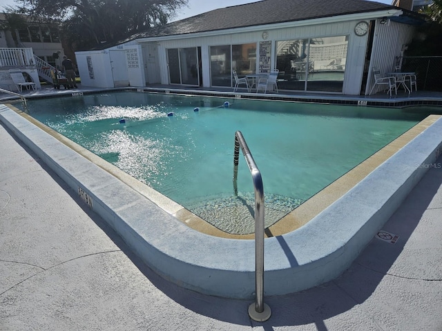 pool featuring a patio