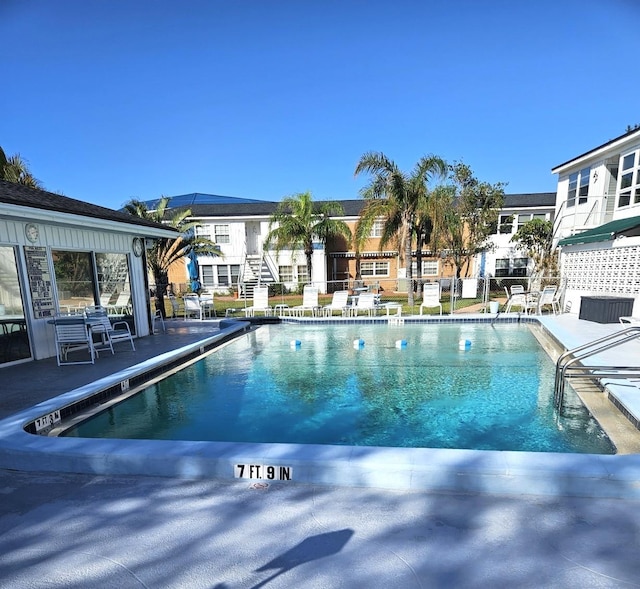 view of pool with a patio area