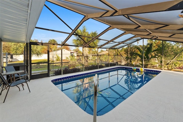 view of pool featuring a patio area and a lanai