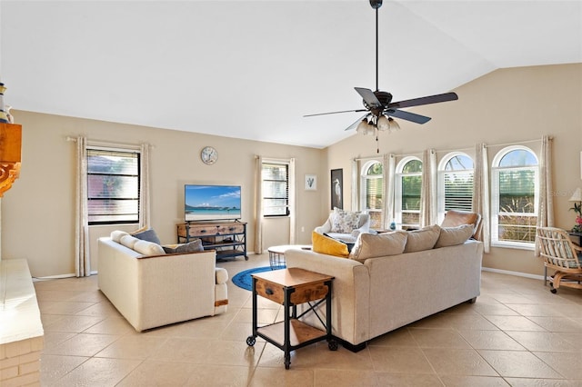 living room featuring lofted ceiling, ceiling fan, and light tile patterned floors