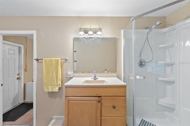 bathroom with vanity, tile patterned floors, and an enclosed shower