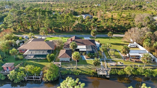 birds eye view of property featuring a water view