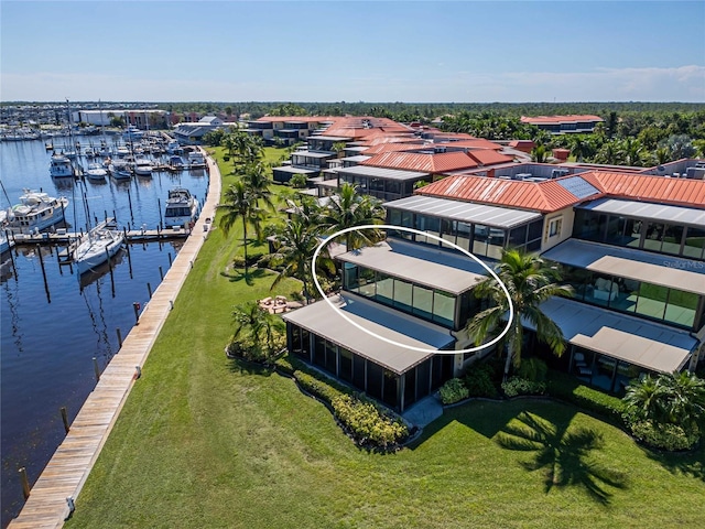 bird's eye view with a water view