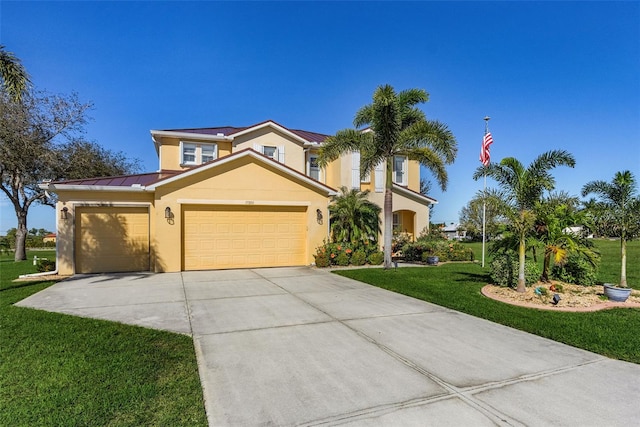 view of front of home featuring a front yard and a garage