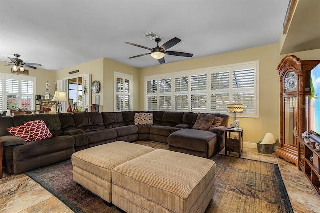 living room with ceiling fan