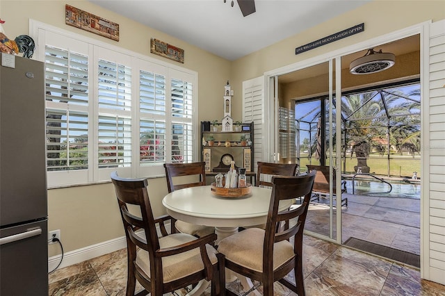 dining room with ceiling fan