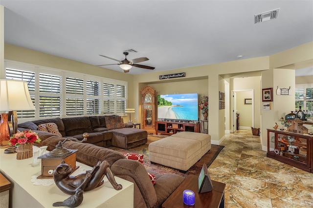 living room featuring ceiling fan