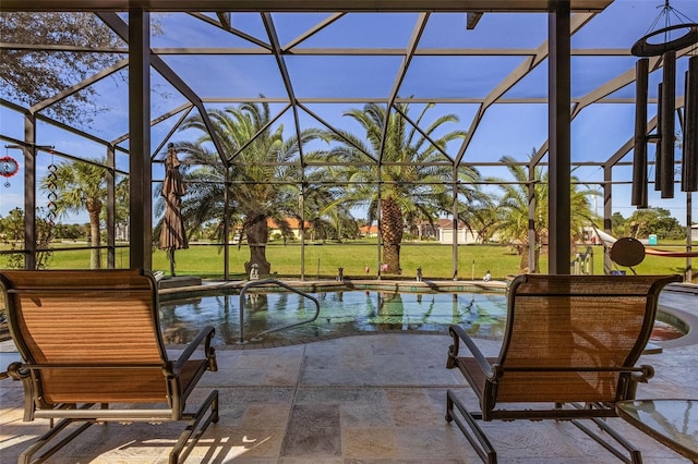 view of patio featuring a lanai