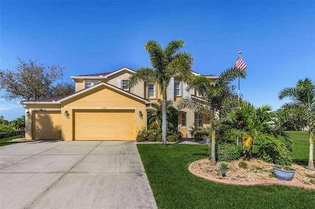 view of front facade with a front yard and a garage