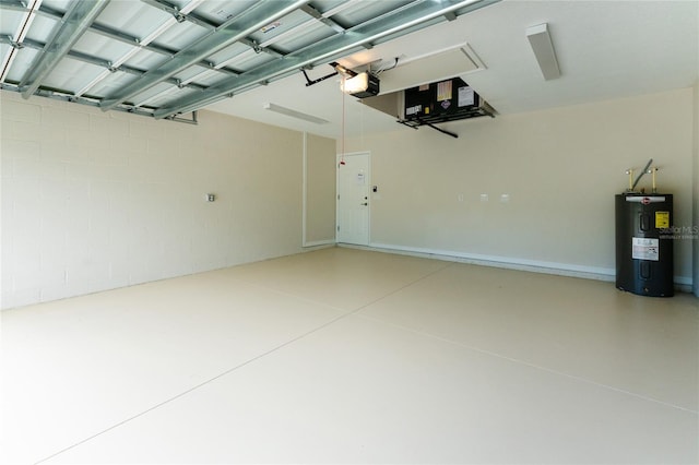 garage featuring water heater and a garage door opener