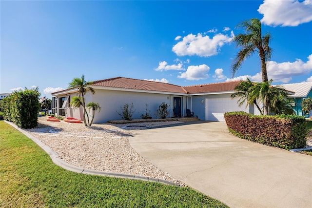 view of front of property with a garage