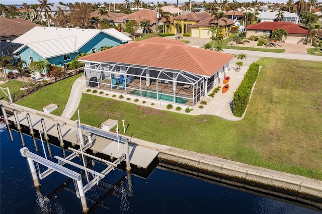 drone / aerial view with a water view