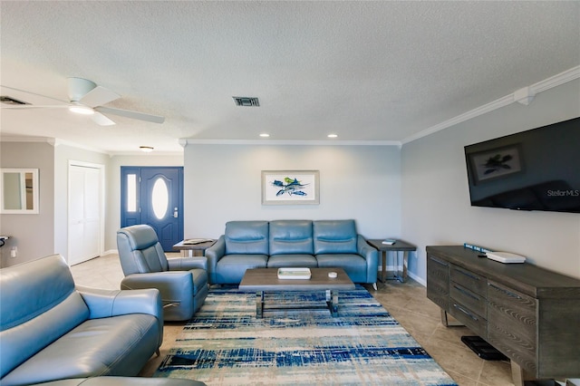 tiled living room with ornamental molding, a textured ceiling, and ceiling fan