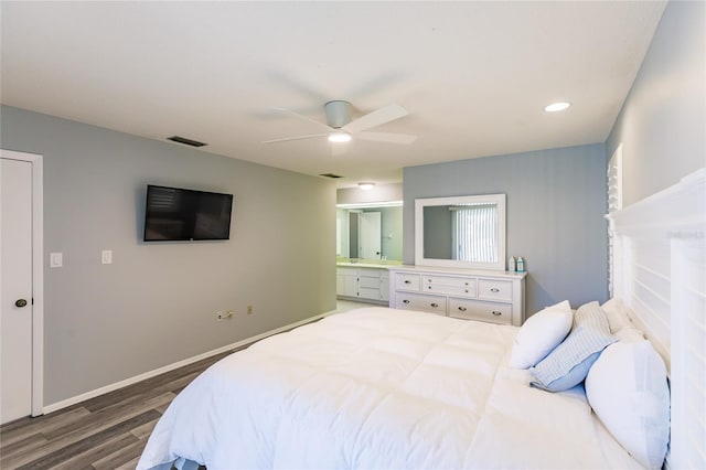 bedroom with ceiling fan and dark hardwood / wood-style floors