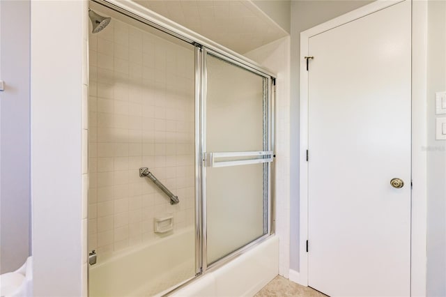 bathroom featuring enclosed tub / shower combo