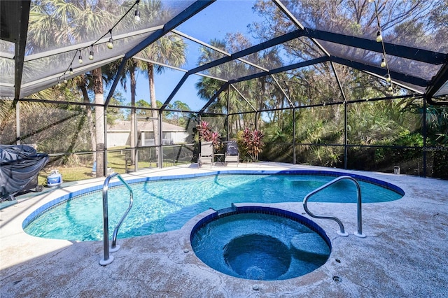 3173 S Cranberry Blvd, North Port, FL 34286 - view of pool featuring a pool with connected hot tub, a patio, and glass enclosure