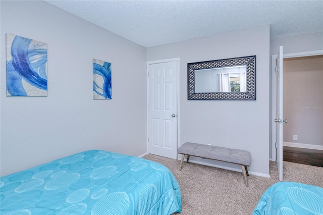 3173 S Cranberry Blvd, North Port, FL 34286 - carpeted bedroom featuring a textured ceiling and baseboards