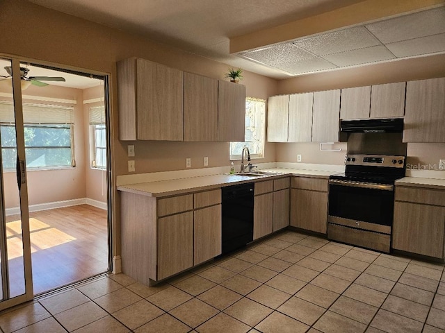 kitchen with stainless steel range with electric cooktop, extractor fan, sink, dishwasher, and light hardwood / wood-style flooring