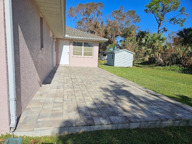 view of patio / terrace featuring a shed