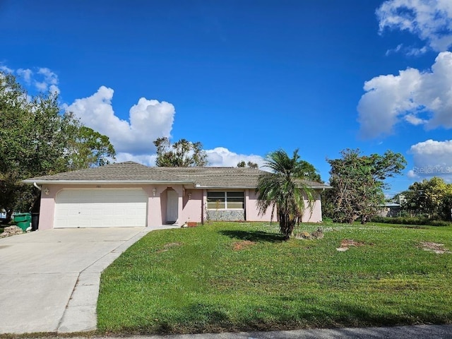 single story home featuring a front yard and a garage