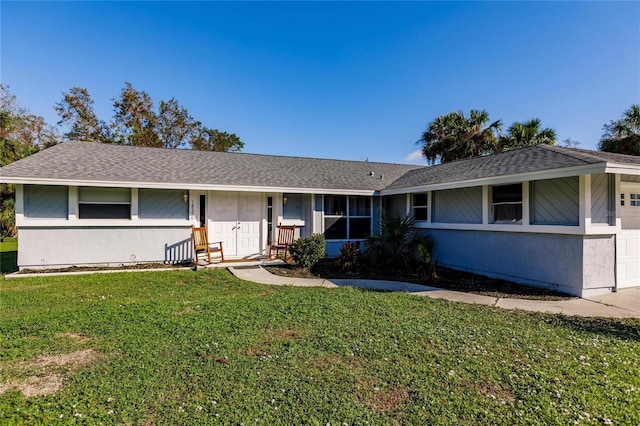 ranch-style house with a front lawn