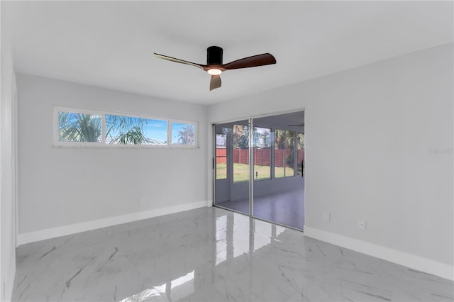 empty room featuring ceiling fan