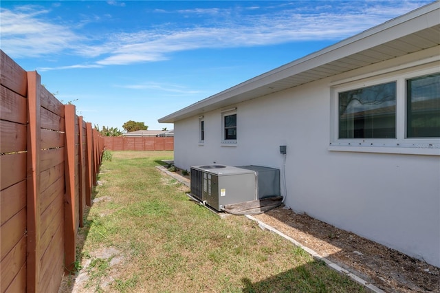 view of yard featuring central AC