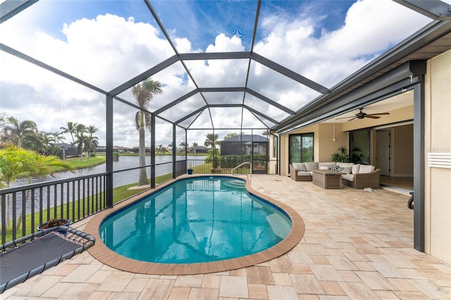 view of swimming pool with an outdoor hangout area, a patio area, a water view, a lanai, and ceiling fan