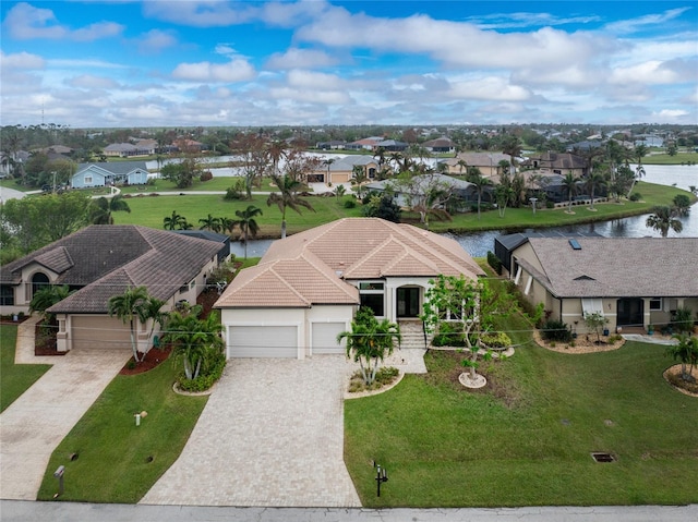 drone / aerial view with a water view