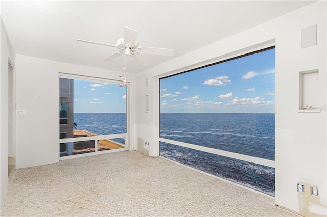 1 Colony Point Dr Unit 16B, Punta Gorda, FL 33950 - carpeted empty room featuring a water view and ceiling fan
