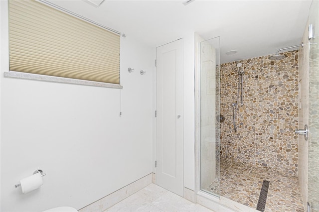 bathroom featuring walk in shower