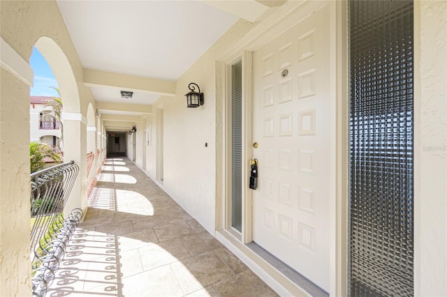 1 Colony Point Dr Unit 16B, Punta Gorda, FL 33950 - doorway to property featuring stucco siding