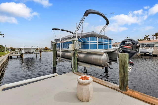 dock area featuring a water view