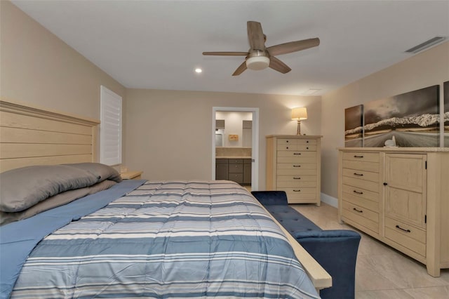 tiled bedroom featuring connected bathroom and ceiling fan