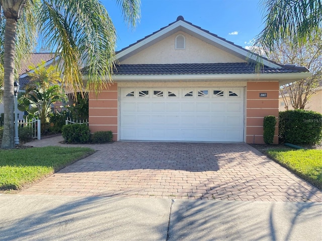 view of front of home with a garage