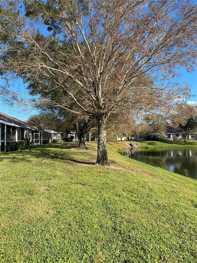 view of yard with a water view