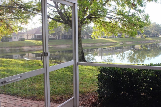 exterior space with a water view