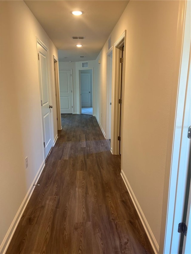 hall featuring dark hardwood / wood-style floors