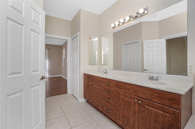 bathroom featuring hardwood / wood-style flooring and vanity