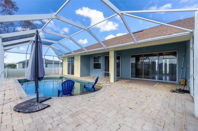 view of pool with a lanai and a patio