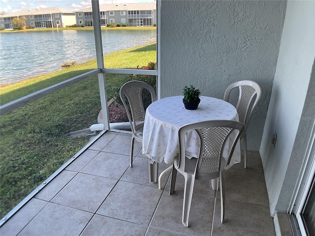 3310 Loveland Blvd Unit 604, Port Charlotte, FL 33980 - sunroom with a water view and a residential view