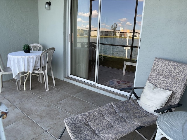 view of balcony at dusk